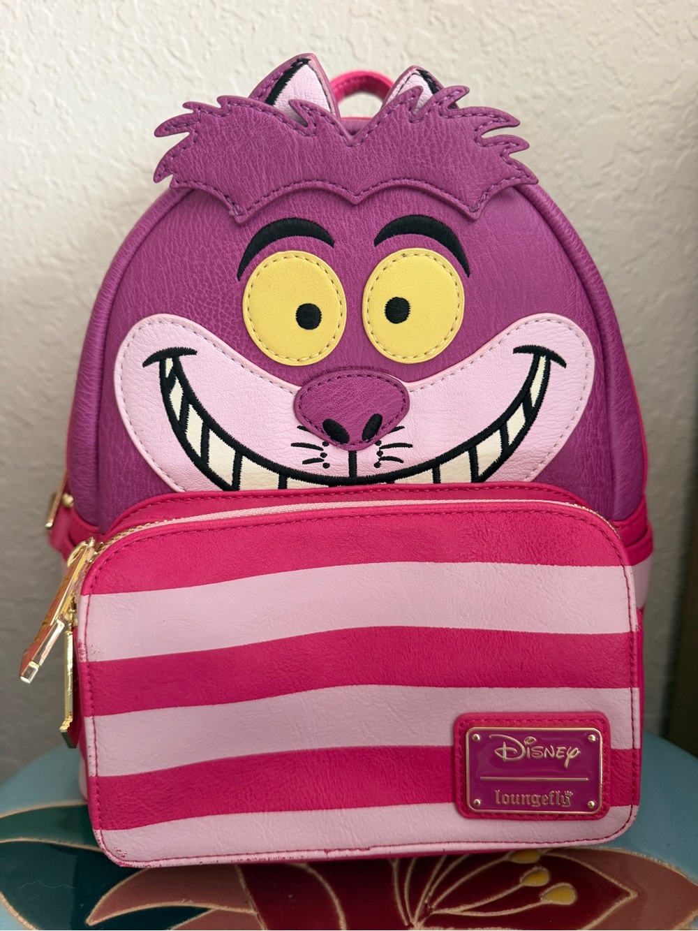 Loungefly Cheshire Cat Pink & Purple Striped Mini Backpack glow in the dark